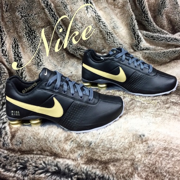 gold nike shox womens